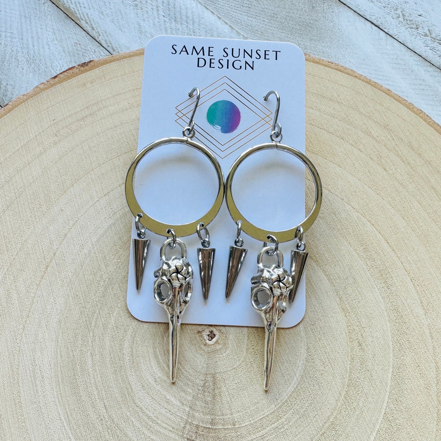 Silver Hoop Bird Skull Earrings