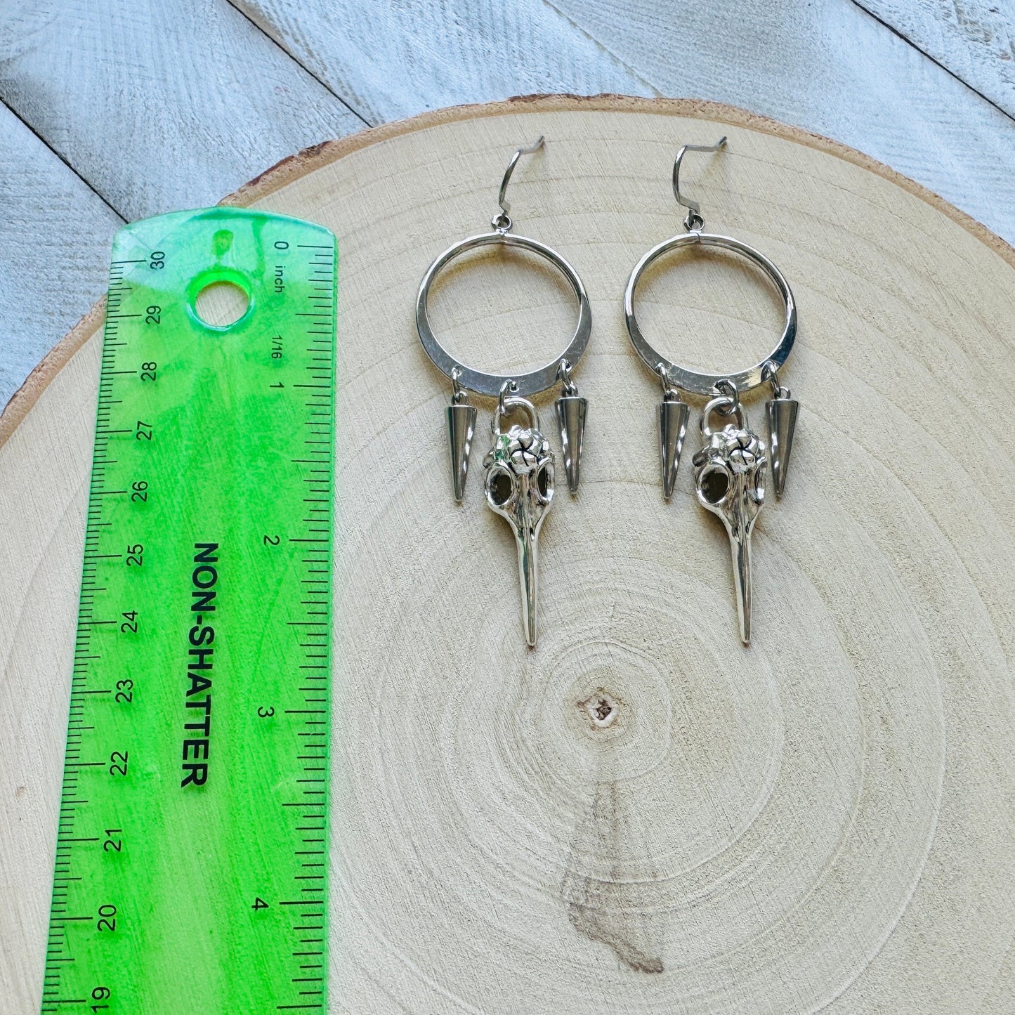 Silver Hoop Bird Skull Earrings