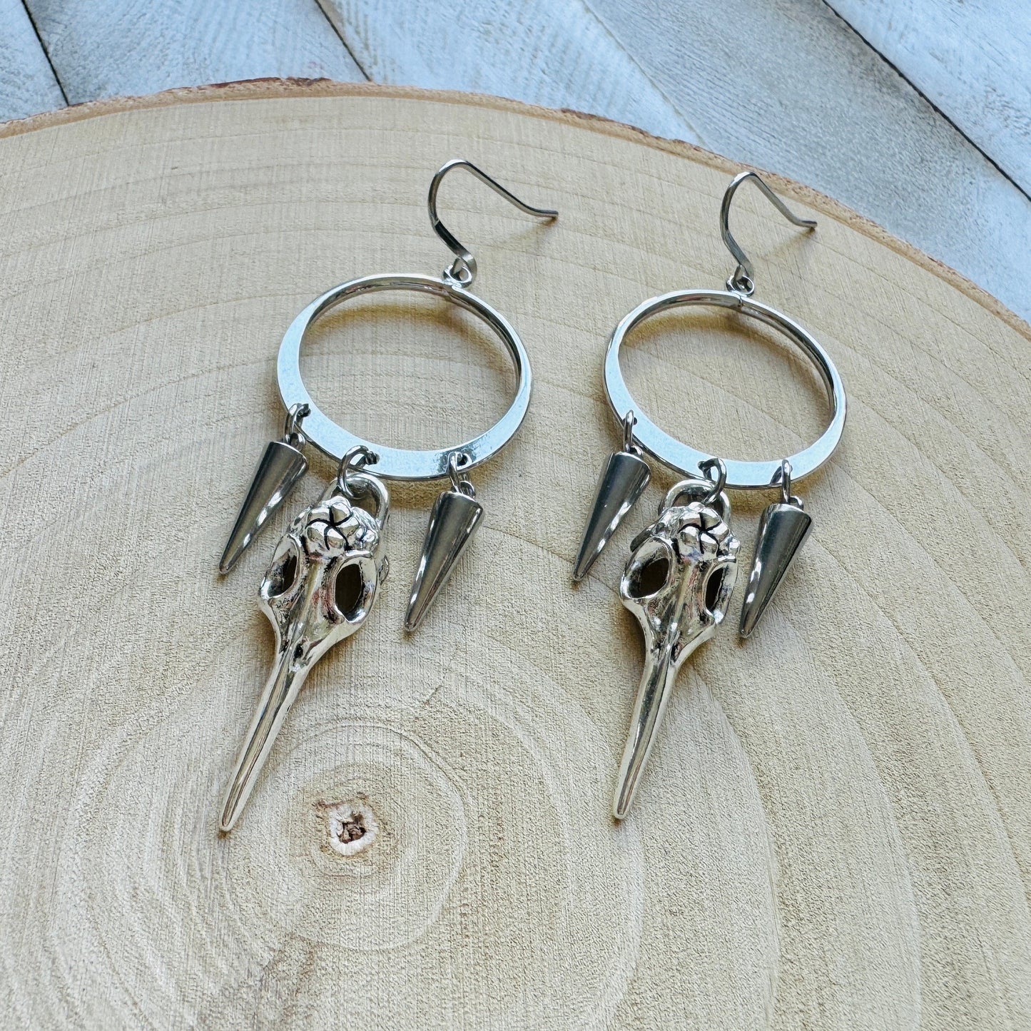 Silver Hoop Bird Skull Earrings